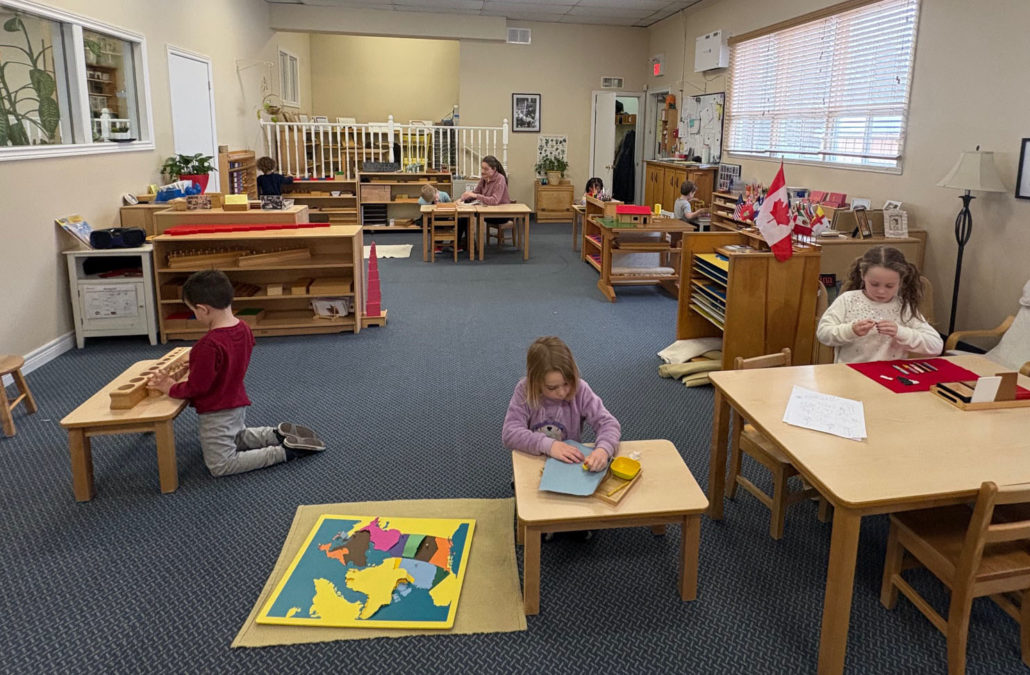 Students working on tools at Nelephant Montessori school